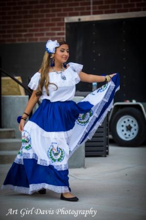 Hispanic Dancer in traditional attire.
